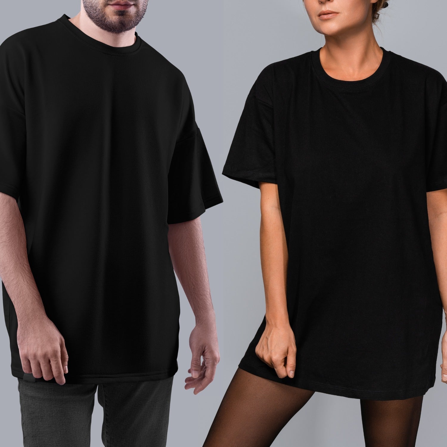 Man and woman wearing black oversized t-shirts from Basic Clothes Co. Oversized Tees collection, showcasing relaxed fit and comfortable style