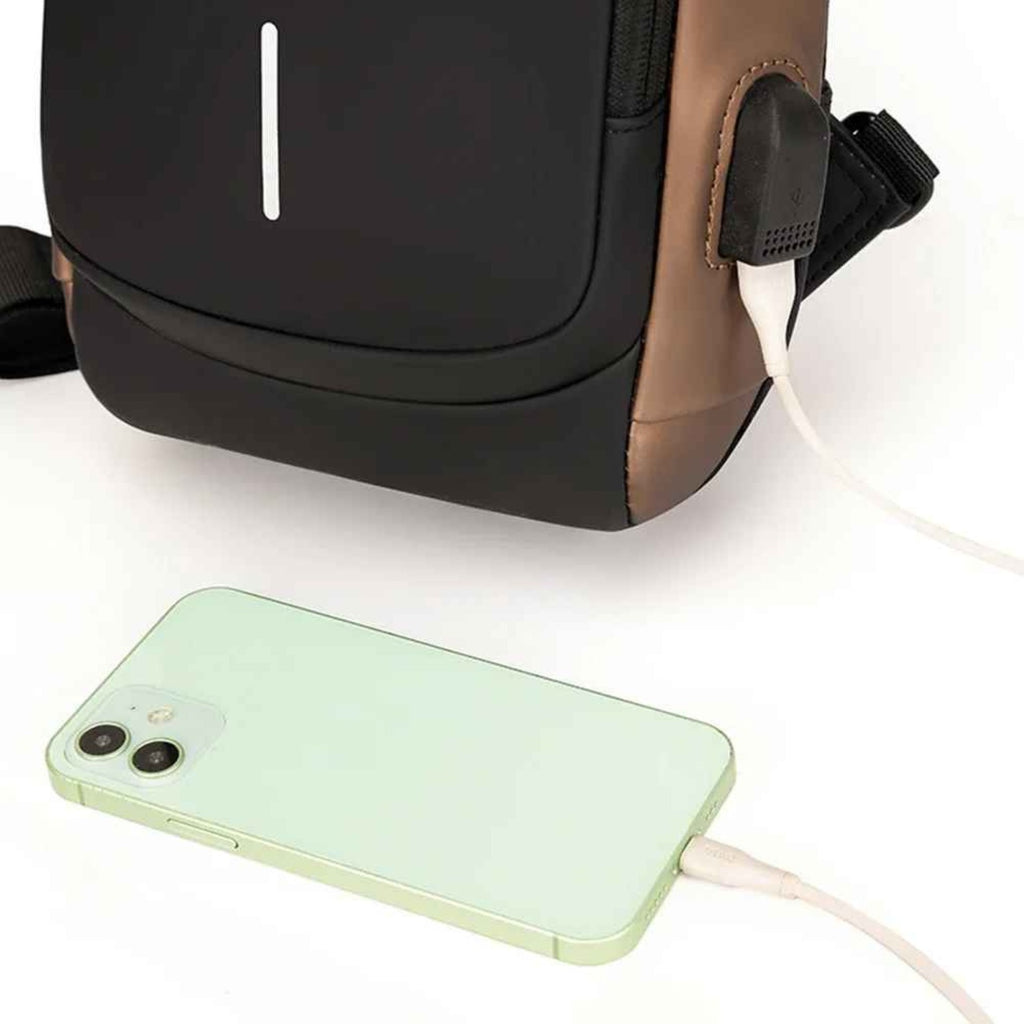 Smartphone securely placed in a dedicated, easy-access pocket inside the Basic Clothes Co. crossbody bag